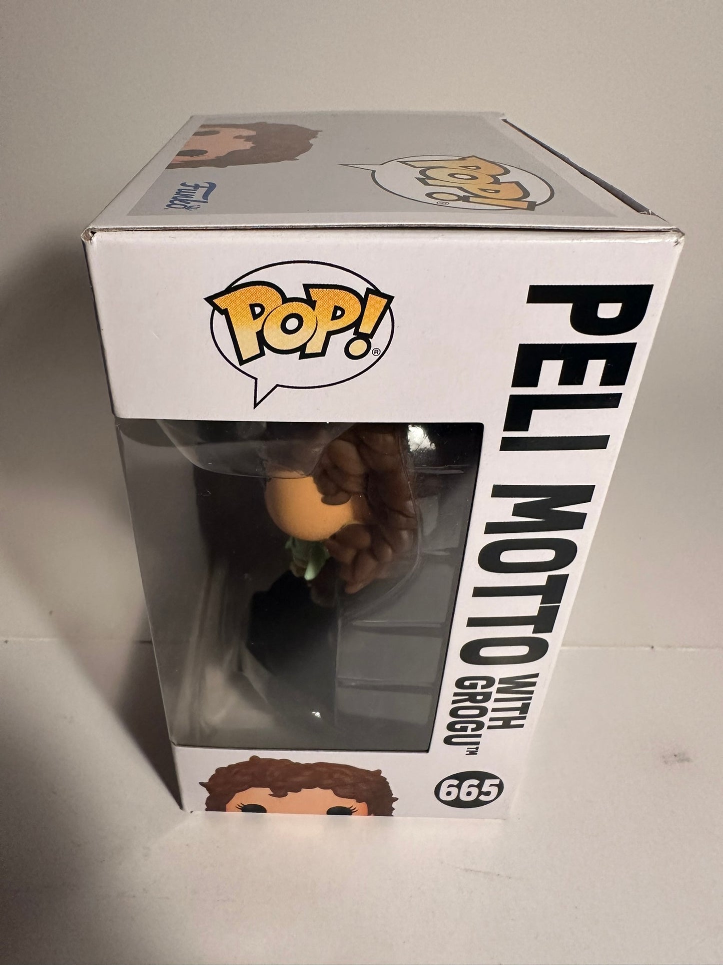 Star Wars - Peli Motto with Grogu 665 Funko Pop!