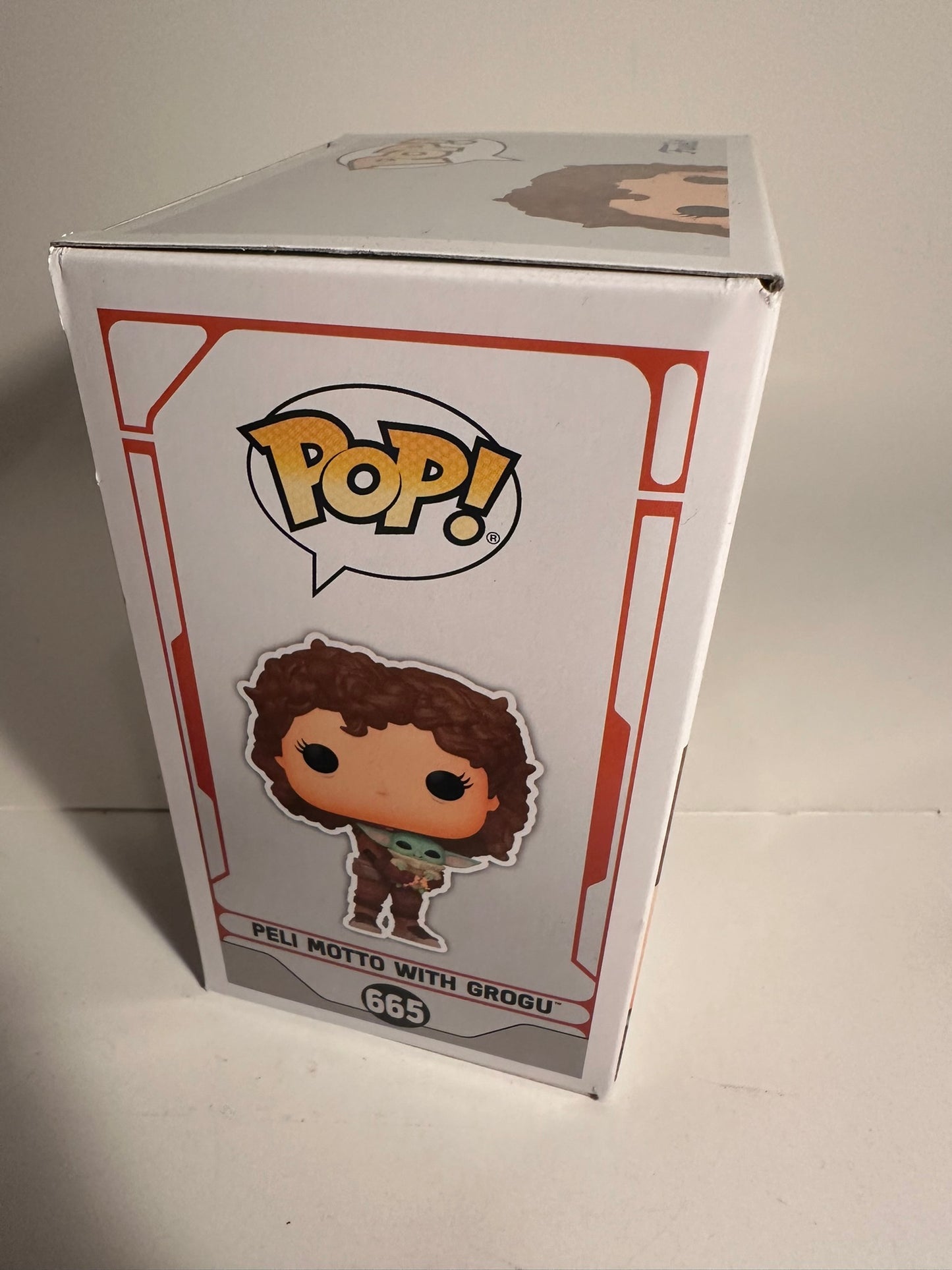 Star Wars - Peli Motto with Grogu 665 Funko Pop!