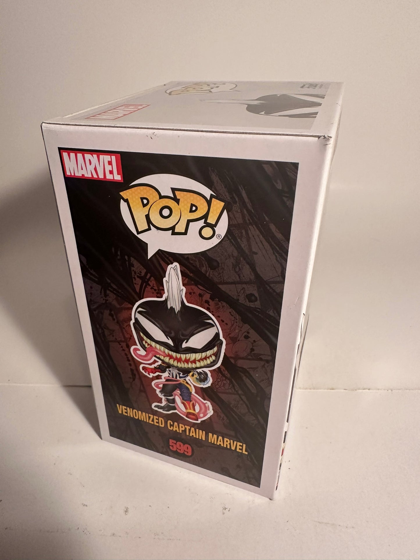 Marvel - Venomized Captain Marvel	599 Funko Pop!